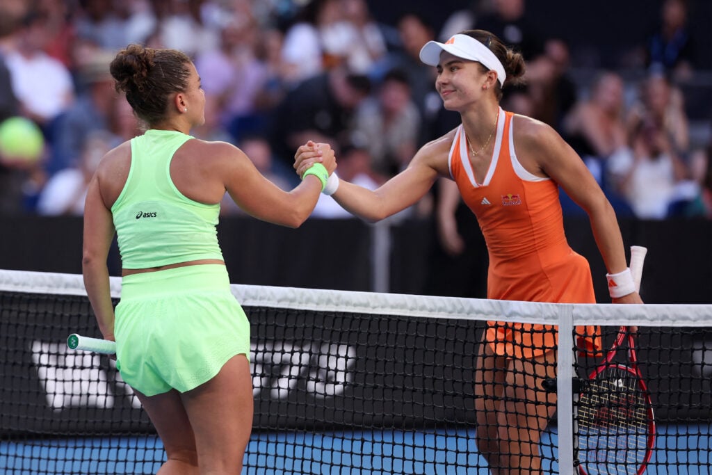 Jasmine Paolini and Iva Jovic shake hands after their match at the 2026 Australian Open
