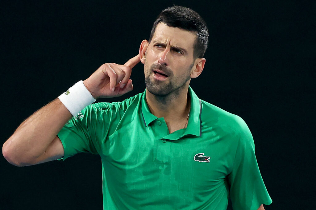 Serbia's Novak Djokovic celebrates a match point against Netherlands' Botic van de Zandschulp during their men's singles match on day seven of the Australian Open tennis tournament.