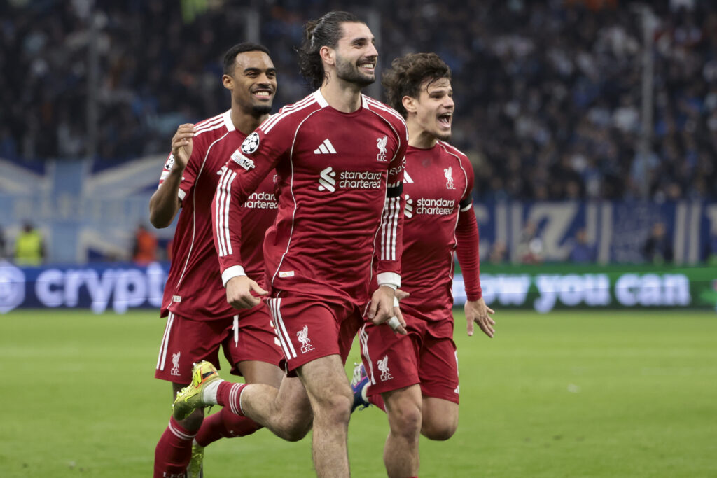 Dominik Szoboszlai of Liverpool celebrates his goal with Ryan Gravenberch, Milos Kerkez during the UEFA Champions League 2025/26 League Phase MD7 football match between Olympique de Marseille (OM) and Liverpool FC at Velodrome stadium.