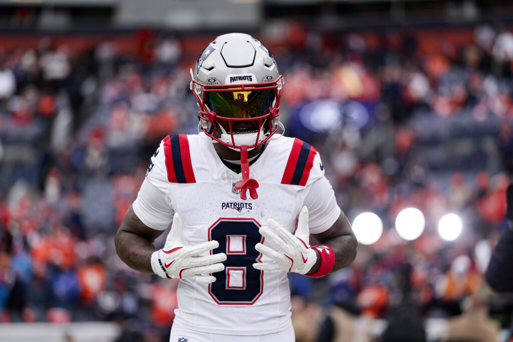 Stefon Diggs #8 of the New England Patriots warms up before the AFC Championship NFL football game against the Denver Broncos at Empower Field At Mile High.
