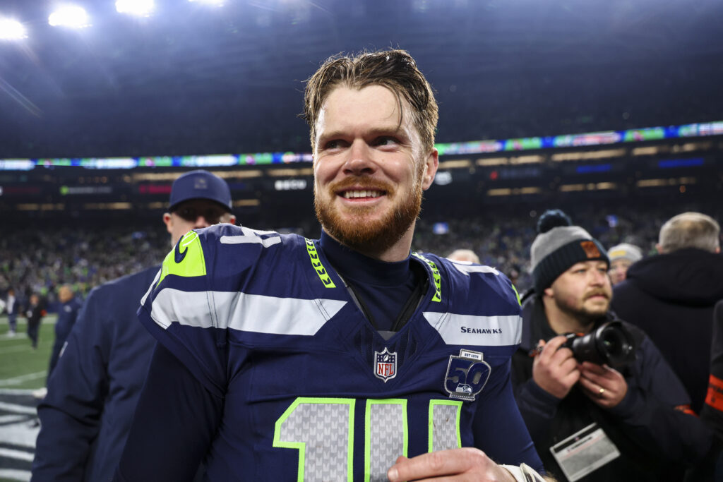 Sam Darnold #14 of the Seattle Seahawks walks on the field after the NFC Championship NFL football game against the Los Angeles Rams.