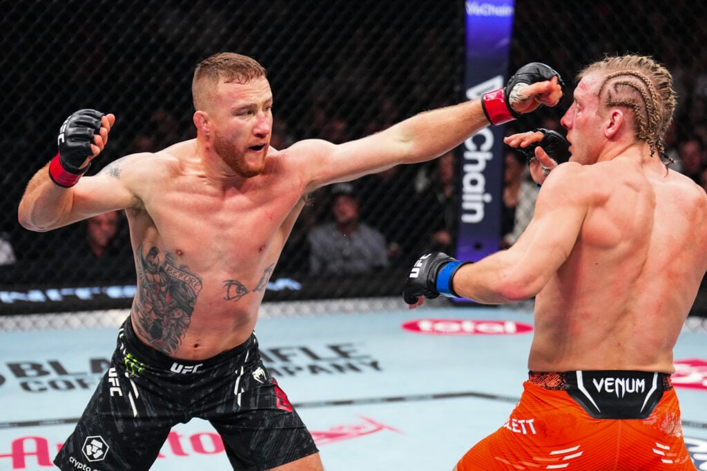 Justin Gaethje punches Paddy Pimblett of England in the UFC lightweight interim championship bout during the UFC 324 event at T-Mobile Arena.