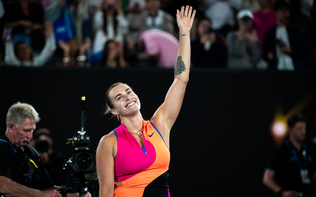 Aryna Sabalenka waves to the Australian Open crowd.