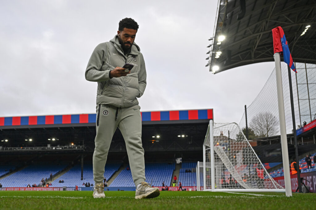 Reece James of Chelsea checks his phone ahead of the Premier League match between Crystal Palace and Chelsea at Selhurst Park on January 25, 2026 in London, England.