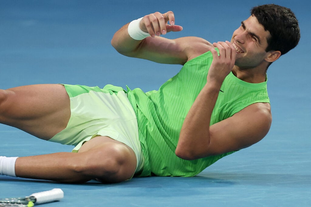 Spain's Carlos Alcaraz celebrates a match point against Germany's Alexander Zverev during their men's singles semi-final match on day thirteen of the Australian Open tennis tournament.