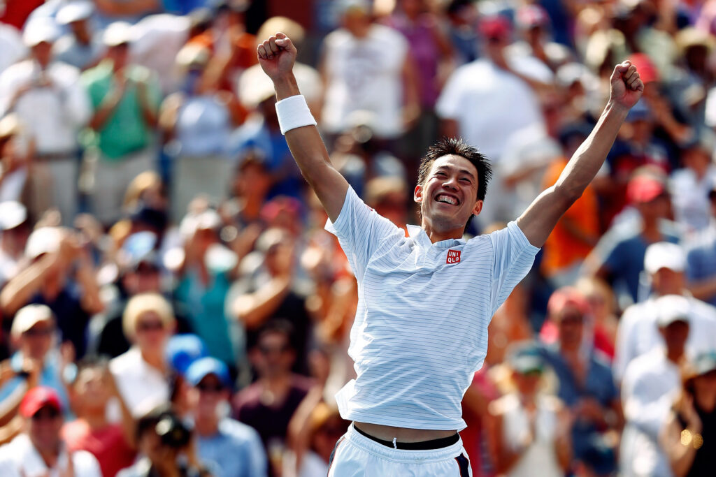 Kei Nishikori celebrates after reaching the 2014 US Open final