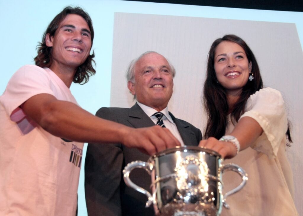 Rafael Nadal poses next to second seed serbian Ana Ivanovic and French Tennis Federation President Christian Bimes during the draw ahead of the start of the French Open.