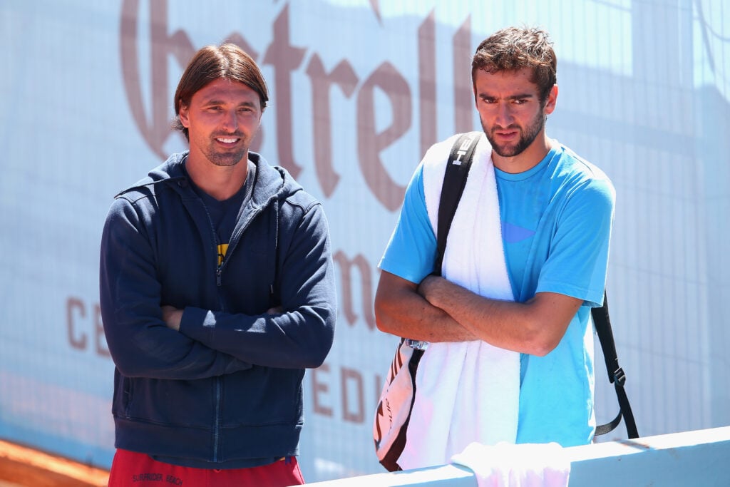 Marin Cilic of Croatia with coach Goran Ivanisevic during day one of the Mutua Madrid Open tennis tournament at the Caja Magica on May 3, 2014 in Madrid, Spain.