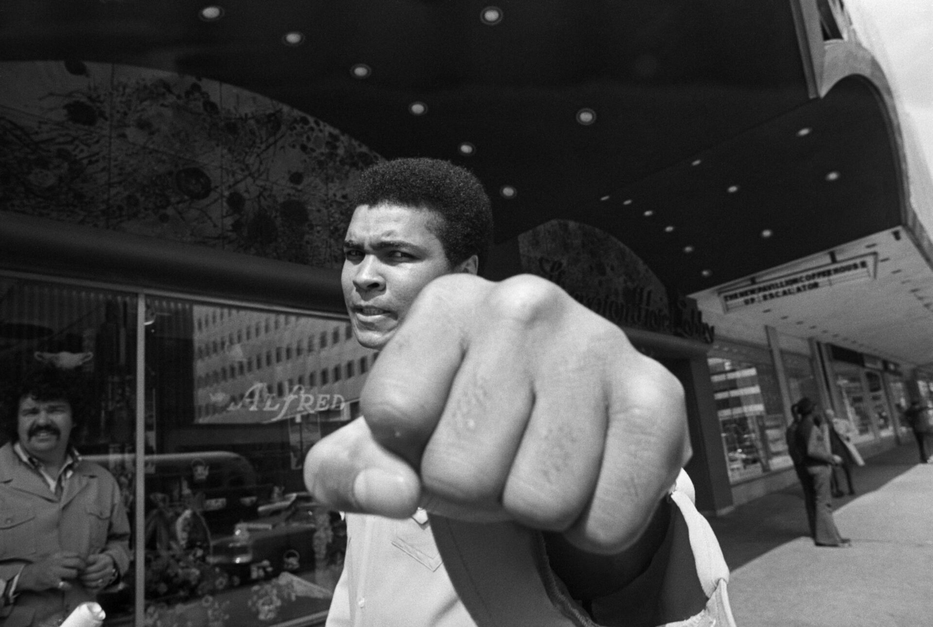 (Original Caption) 5/10/73 Philadelphia,PA: Muhammad Ali now 31-years old is still aiming for the heavyweight title as he shows his left fist to th...