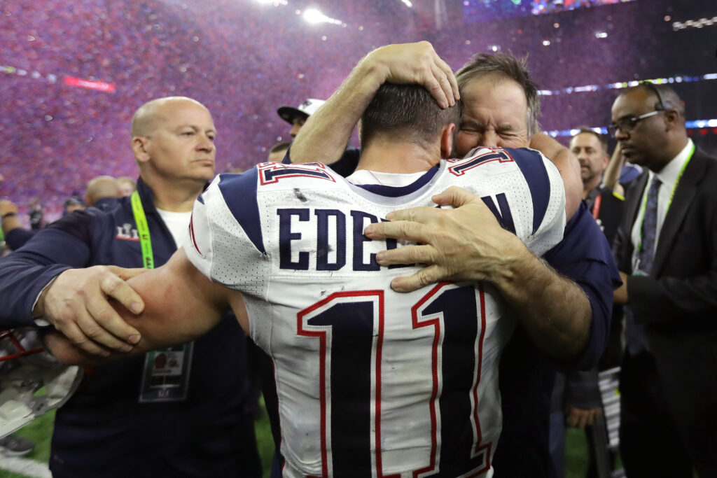 Head coach Bill Belichick of the New England Patriots celebrates with Julian Edelman #11 after the Patriots defeat the Atlanta Falcons 34-28 during Super Bowl 51.