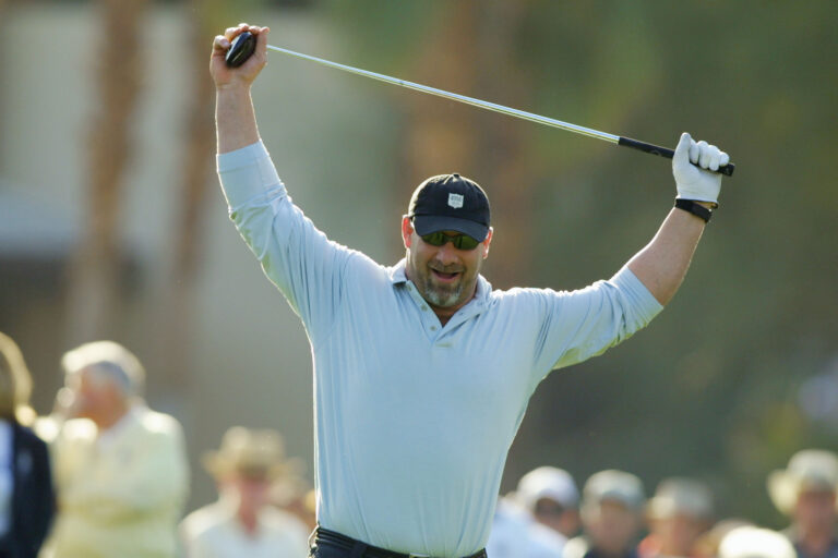 16 Jan 2002: Wrestler Goldberg stretches on the 10th hole during the opening round of the Bob HopeChrysler Classic at Indian Wells Country Club in ...