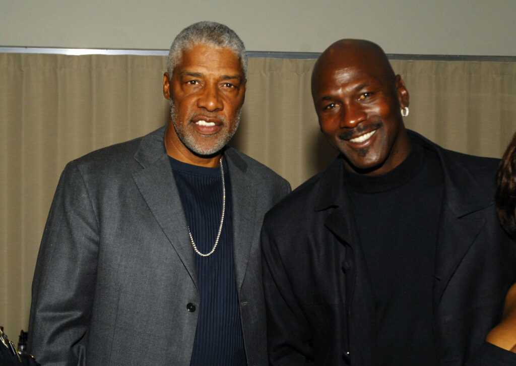 NBA basketball legends Julius "Dr. J" Erving (L) and Michael Jordan pose at the Muhammad Ali birthday celebration and VIP Reception during the events for the 133rd Kentucky Derby.