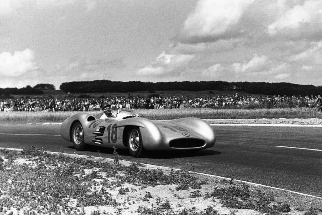 Juan Manuel Fangio in his Mercedes F1 car at the 1954 French Grand Prix.