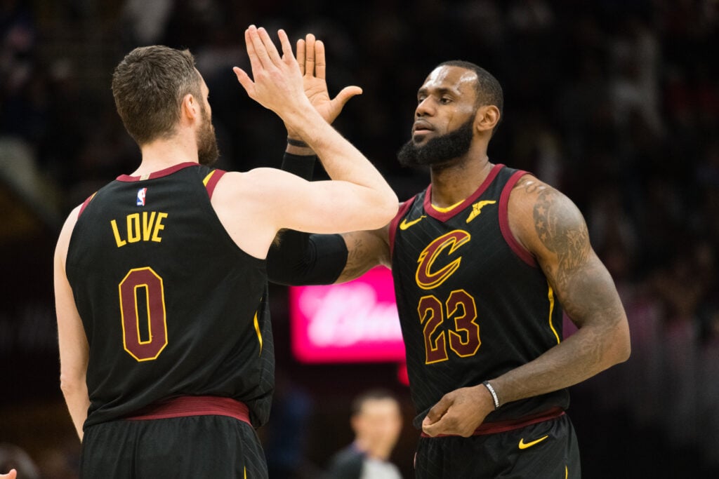 Kevin Love #0 celebrates with LeBron James #23 of the Cleveland Cavaliers.