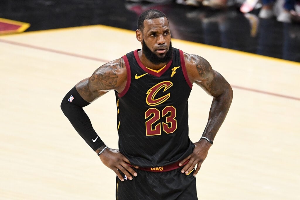 LeBron James #23 of the Cleveland Cavaliers reacts in the first half against the Golden State Warriors during Game Four of the 2018 NBA Finals at Quicken Loans Arena on June 8, 2018 in Cleveland, Ohio.