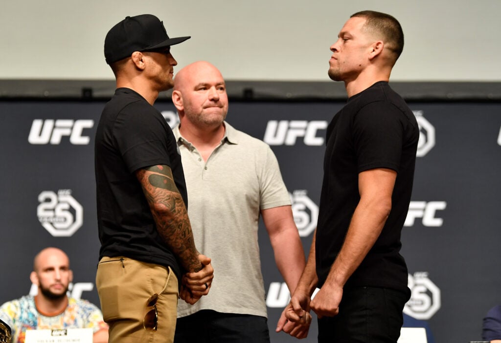 Opponents Dustin Poirier and Nate Diaz face off during the UFC press conference inside the Orpheum Theater on August 3, 2018 in Los Angeles, California.