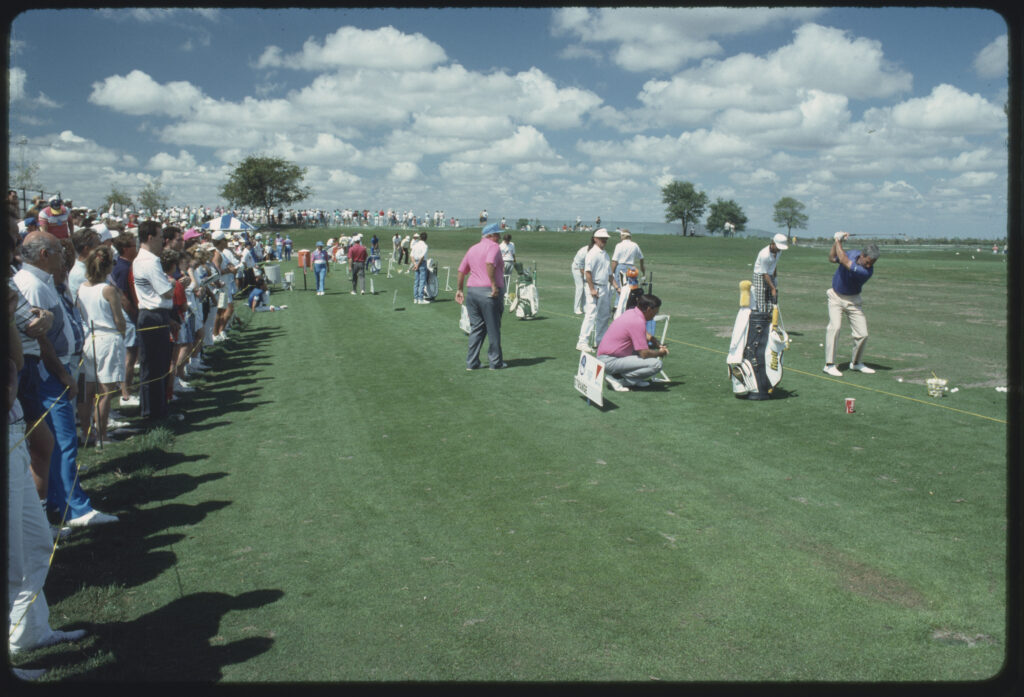 Players warm up on the driving range prior to the 1990 Honda Classic