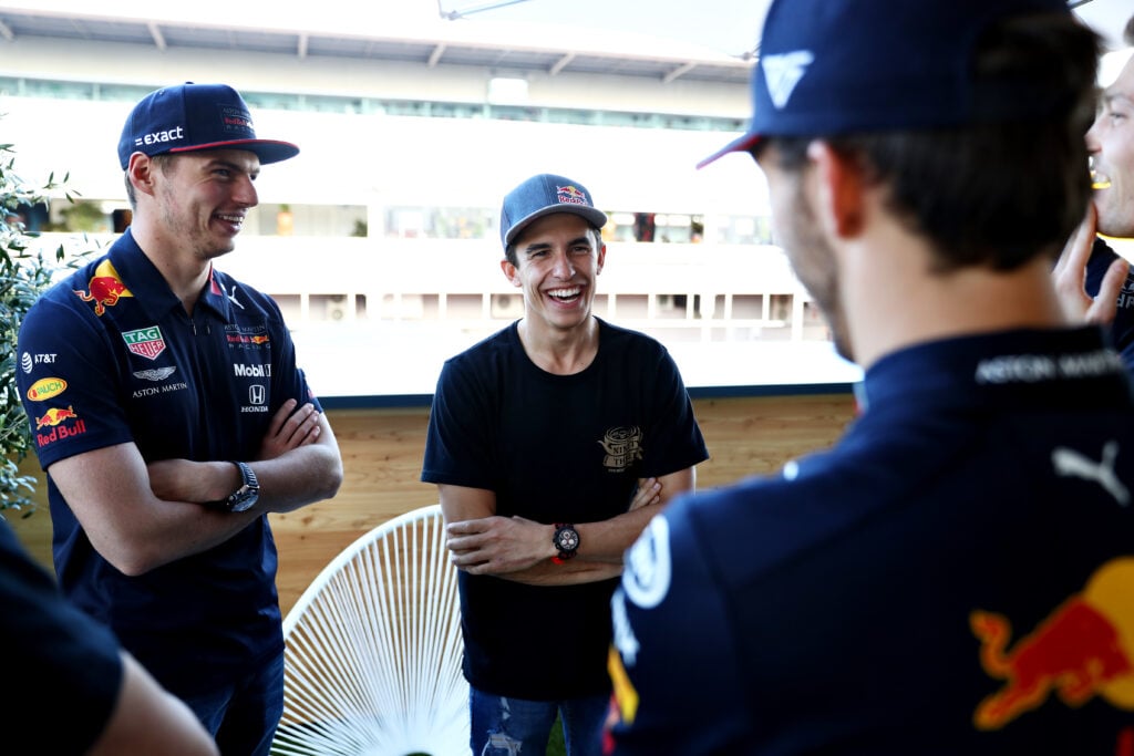 Marc Marquez speaking to Red Bull's Max Verstappen and Pierre Gasly at the 2018 Spanish Grand Prix.