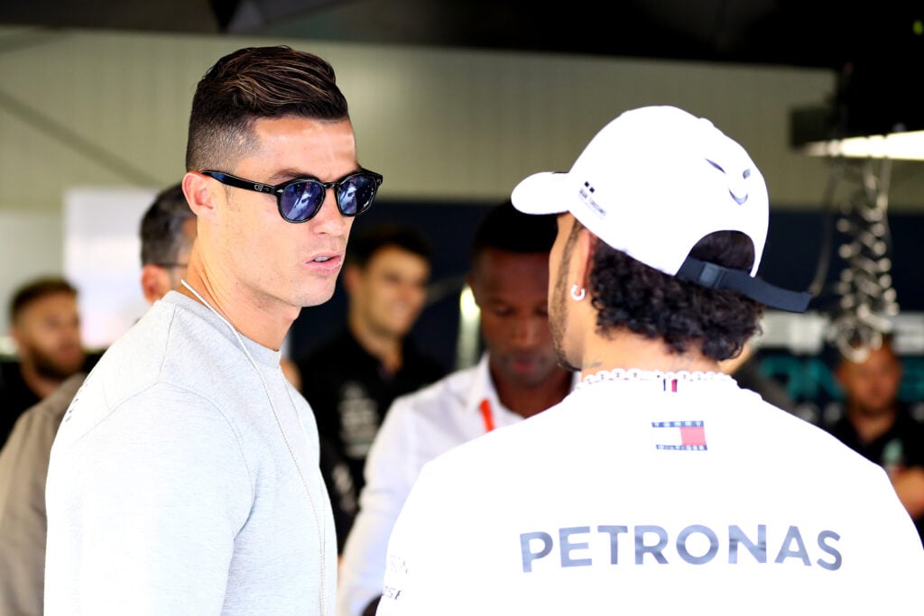 Cristiano Ronaldo and Mercedes driver Lewis Hamilton speaking at the 2019 Monaco Grand Prix