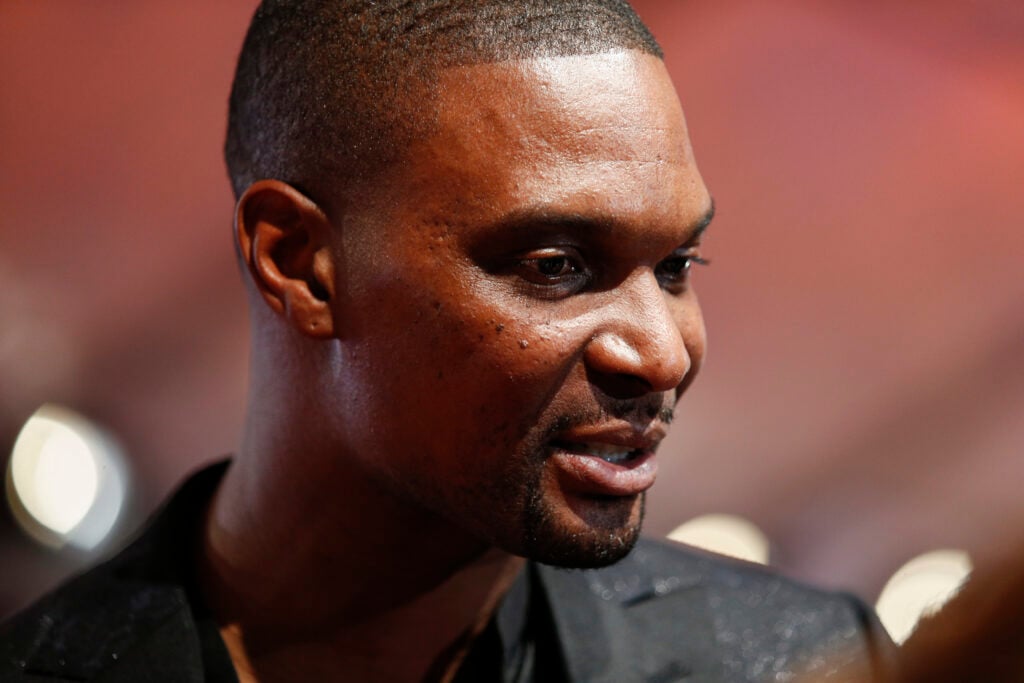 Retired NBA basketball star Chris Bosh walks the red carpet at the 2022 Juno awards.