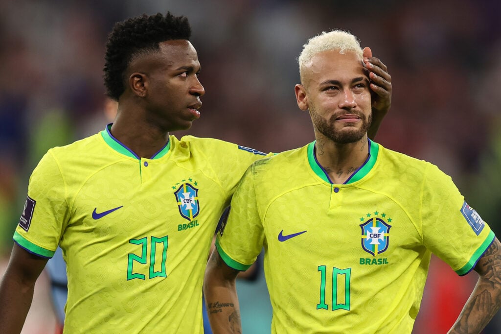 A tearful Neymar of Brazil is comforted by Vinicius Junior after they lose on penalties during the FIFA World Cup Qatar 2022 quarter final match between Croatia and Brazil at Education City Stadium.