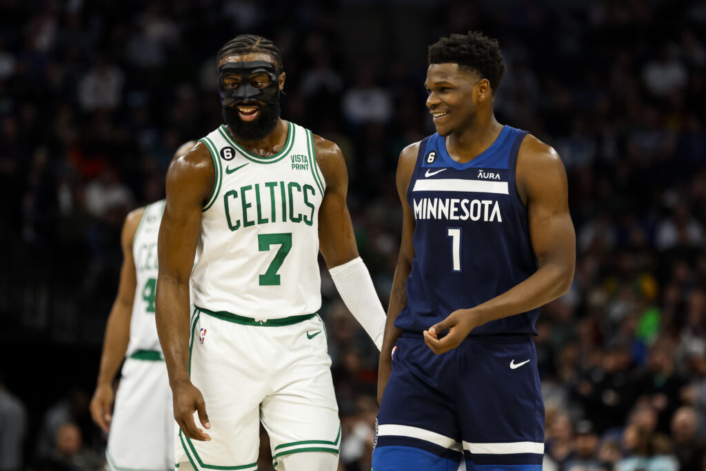 Jaylen Brown #7 of the Boston Celtics and Anthony Edwards #1 of the Minnesota Timberwolves interact in the second quarter of the game at Target Center.
