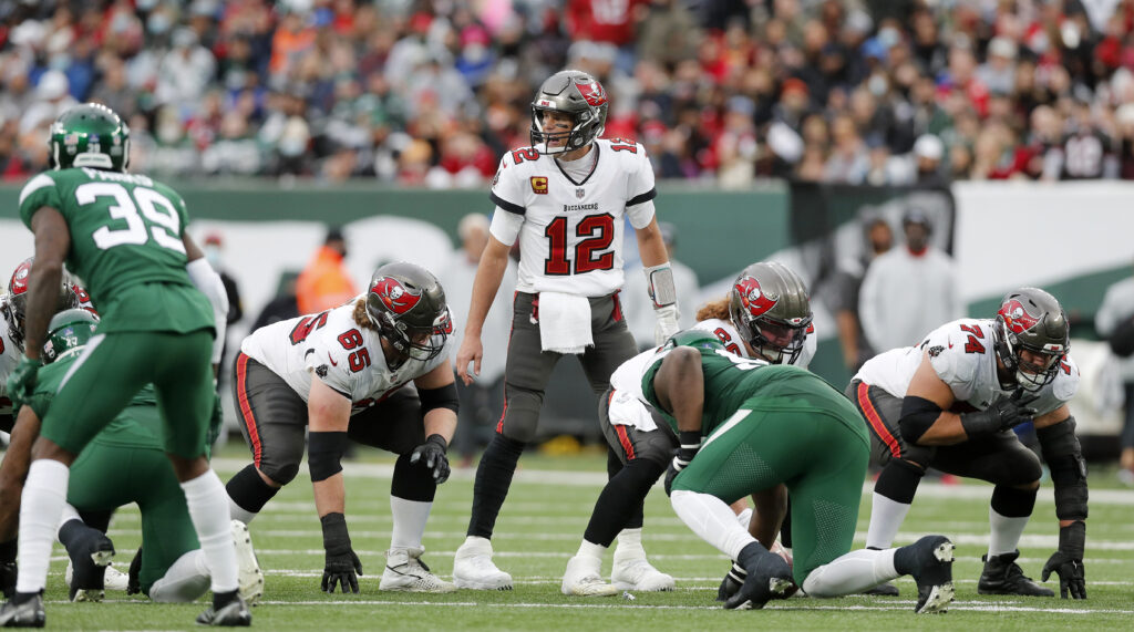 Tom Brady #12 of the Tampa Bay Buccaneers in action against the New York Jets at MetLife Stadium on January 02, 2022 in East Rutherford, New Jersey. The Buccaneers defeated the Jets 28-24.