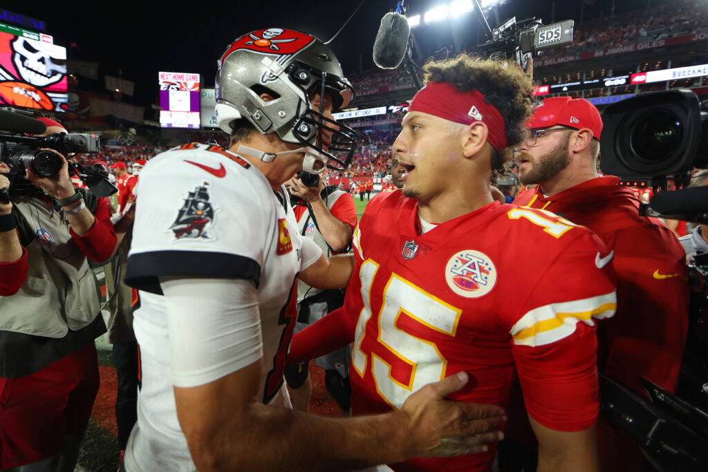 Patrick Mahomes #15 of the Kansas City Chiefs shakes hands with Tom Brady #12 of the Tampa Bay Buccaneers after defeating the Tampa Bay Buccaneers 41-31 at Raymond James Stadium.