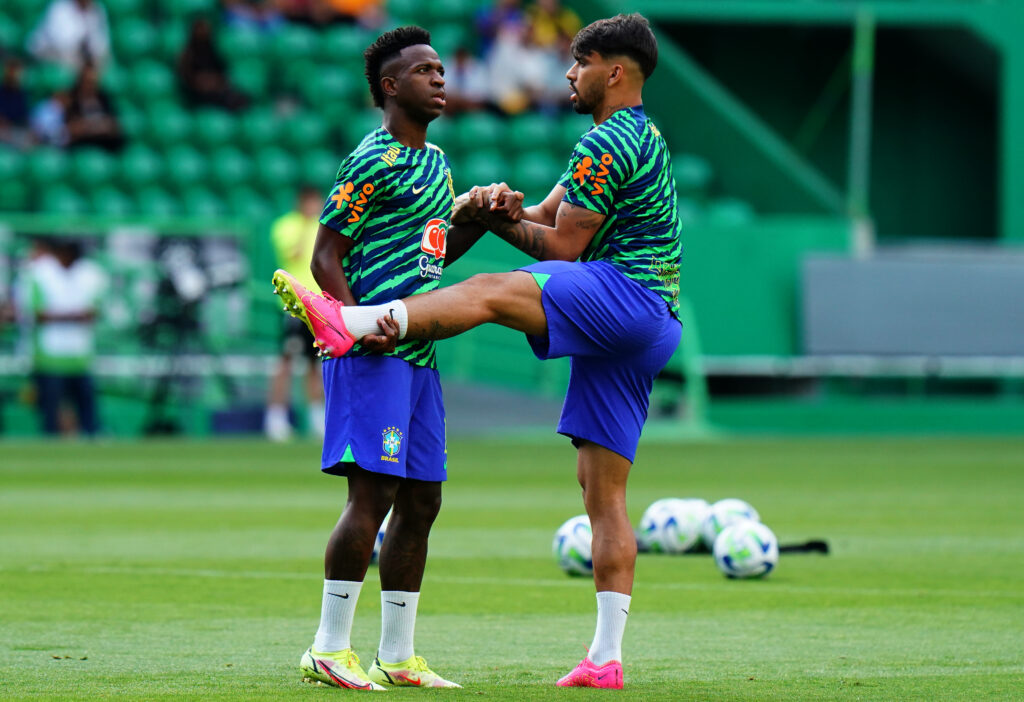 Vinicius Junior of Brazil with Lucas Paqueta of Brazil in action during the warm up before the start of the International Friendly match between Brazil and Senegal at Estadio Jose Alvalade.