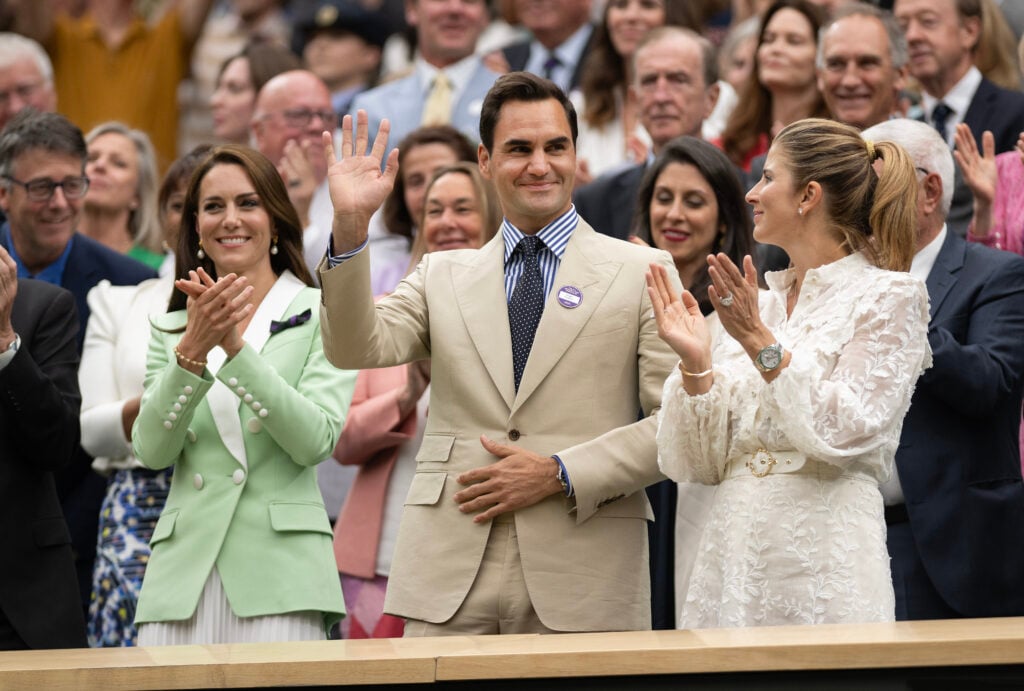 Roger Federer waves