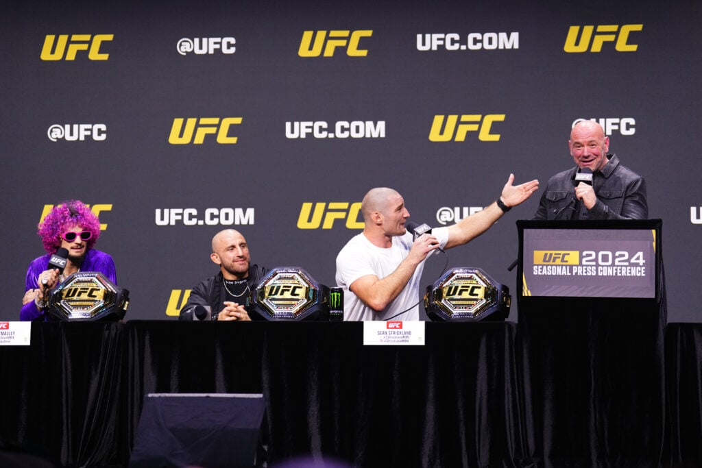 UFC CEO Dana White, UFC middleweight champion Sean Strickland, UFC featherweight champion Alexander Volkanovski, and UFC bantamweight champion Sean O'Malley are seen on stage during the UFC 2024 seasonal press conference at MGM Grand Garden Arena on December 15, 2023 in Las Vegas, Nevada.