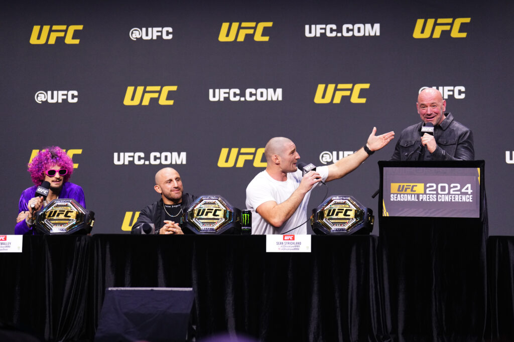 UFC CEO Dana White, UFC middleweight champion Sean Strickland, UFC featherweight champion Alexander Volkanovski, and UFC bantamweight champion Sean O'Malley are seen on stage during the UFC 2024 seasonal press conference at MGM Grand Garden Arena on December 15, 2023.