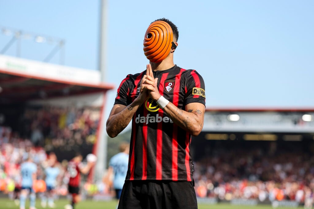 Dominic Solanke of Bournemouth wears a Japanese Anime mask in celebration after he scores a goal to make it 1-1 during the Premier League match between AFC Bournemouth and Brentford FC at Vitality Stadium.