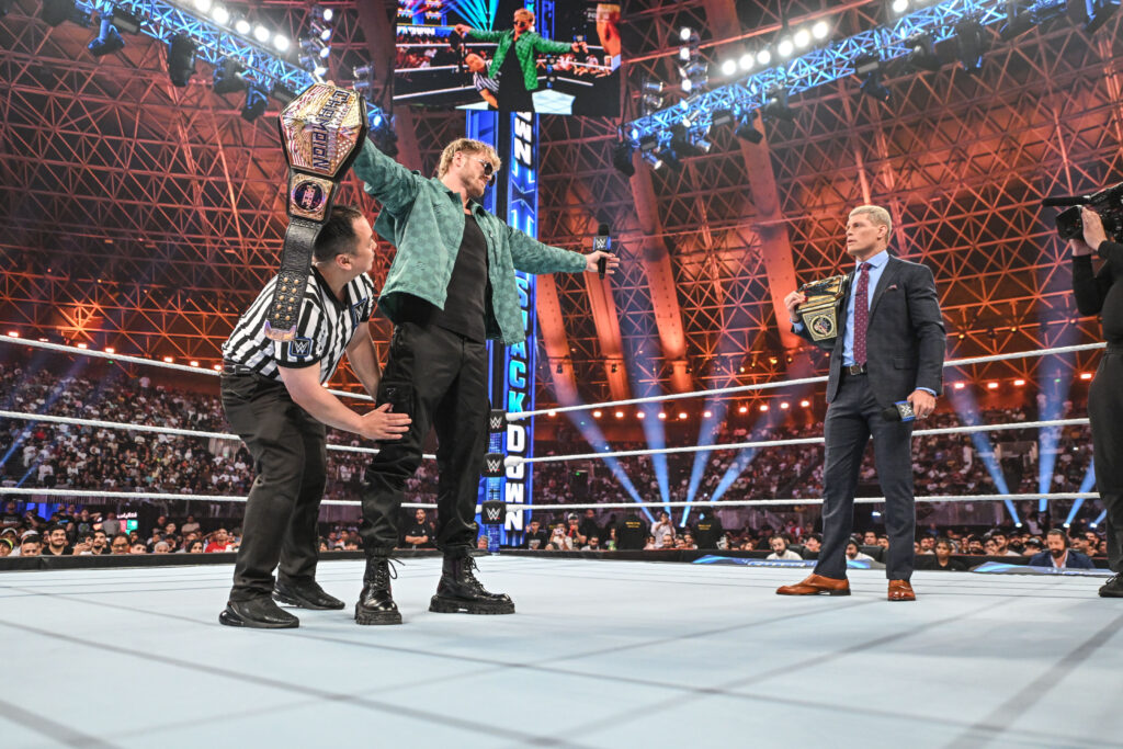 WWE Referee Ryan Tran searches Logan Paul in the ring while Cody Rhodes looks on during SmackDown at Jeddah Superdome on May 24, 2024 in Jeddah, Saudi Arabia.