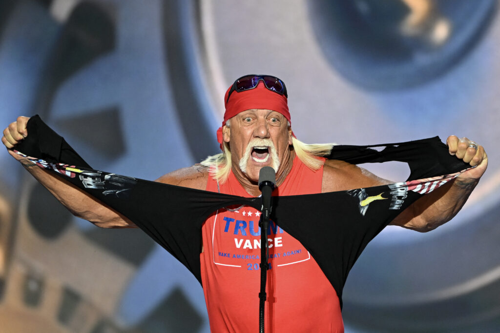 US pro-wrestler Hulk Hogan rips his shirt off to reveal a Trump-Vance campaign shirt during the last day of the 2024 Republican National Convention at the Fiserv Forum.