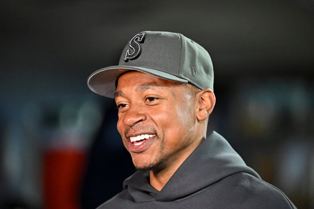 Former NBA player Isaiah Thomas smiles before the game between the Seattle Mariners and the San Francisco Giants at T-Mobile Park.