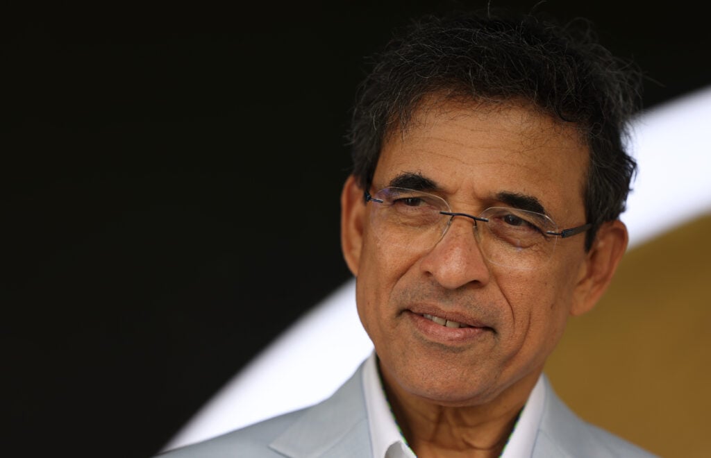 Indian cricket commentator Harsha Bhogle, looks on during the ICC Champions Trophy 2025 match between Bangladesh and India at Dubai International Cricket Stadium.