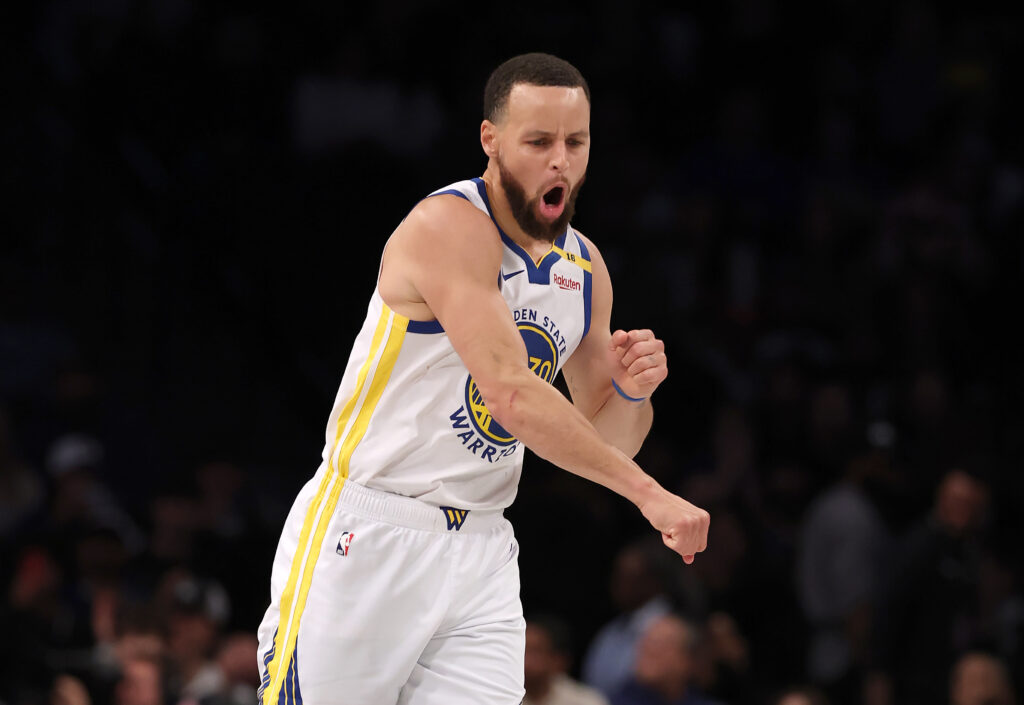Stephen Curry #30 of the Golden State Warriors celebrates in the third quarter against the Brooklyn Nets at Barclays Center on March 06, 2025 in the Brooklyn borough of New York City. The Golden State Warriors defeated the Brooklyn Nets 121-119.