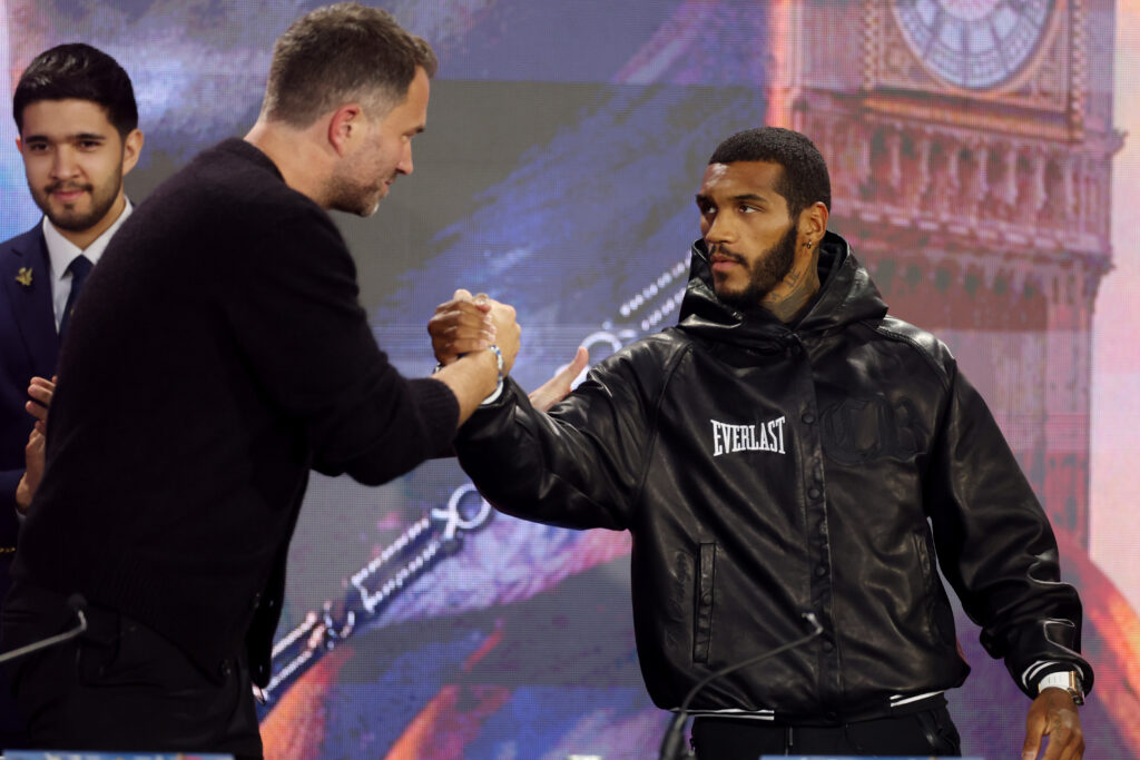 Eddie Hearn, Chairman of Matchroom Sport and Professional Darts Corporation, shakes hands with Conor Benn ahead of the Middleweight fight between Chris Eubank Jr and Conor Benn during the Fatal Fury.