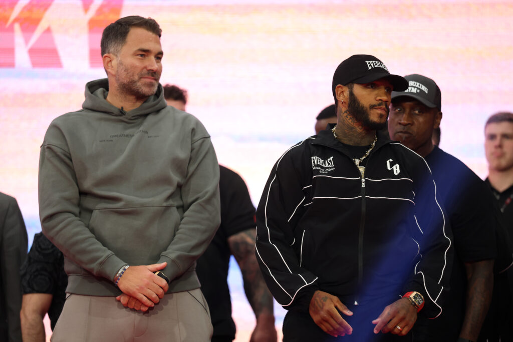 Conor Benn and Eddie Hearn, Chairman of Matchroom Sport and Professional Darts Corporation look on during the weigh in event ahead of the Middleweight fight between Chris Eubank Jr and Conor Benn on the ‘Fatal Fury: City of the Wolves’ fight card at Business Design Center.
