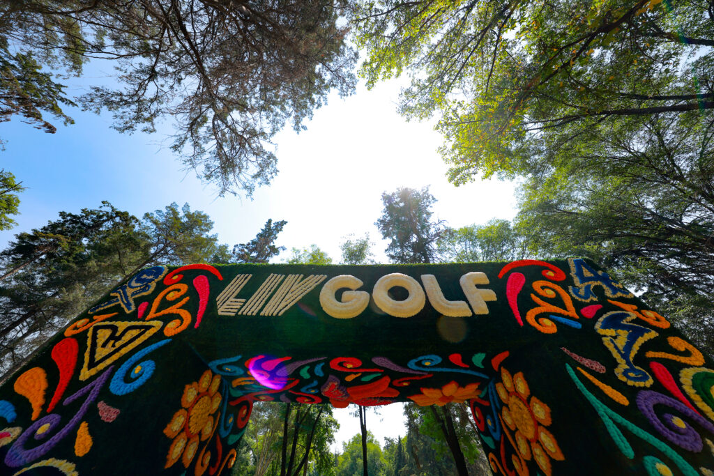 A flower-adorned archway displaying the LIV Golf logo is seen on day one of LIV Golf Mexico City at Club de Golf Chapultepec on April 25, 2025.