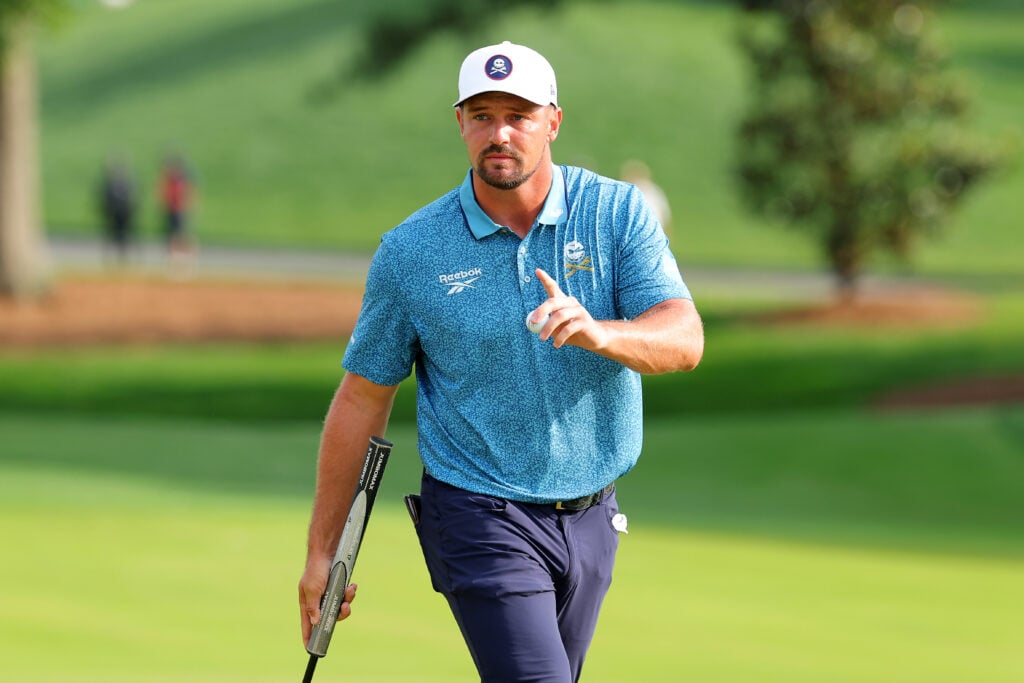 Bryson DeChambeau of the United States reacts on the tenth green during the second round of the PGA Championship at Quail Hollow Country Club on May 16, 2025