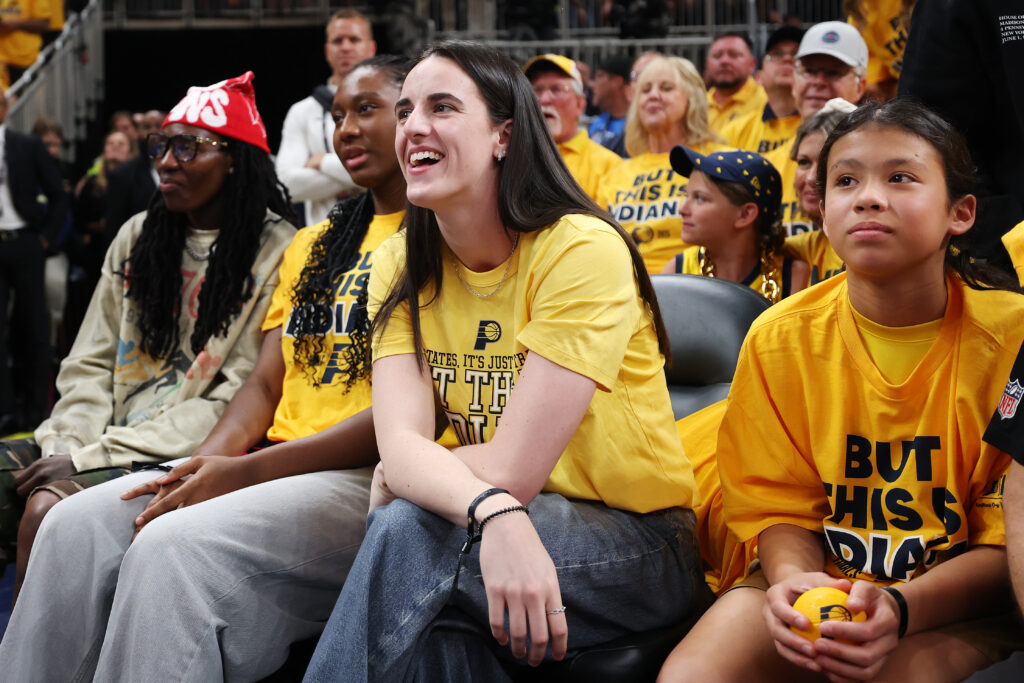 Caitlin Clark of the Indiana Fever looks on during the second quarter in Game Three of the 2025 NBA Finals between the Indiana Pacers and the Oklahoma City Thunder at Gainbridge Fieldhouse on June 11, 2025 in Indianapolis, Indiana.