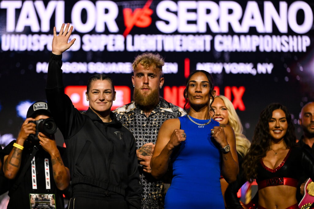 Katie Taylor, left, and Amanda Serrano with Jake Paul, co-Founder of Most Valuable Promotions, during a press conference, held at The Theater at Madison Square Garden in New York, USA, ahead of their undisputed super lightweight championship fight.