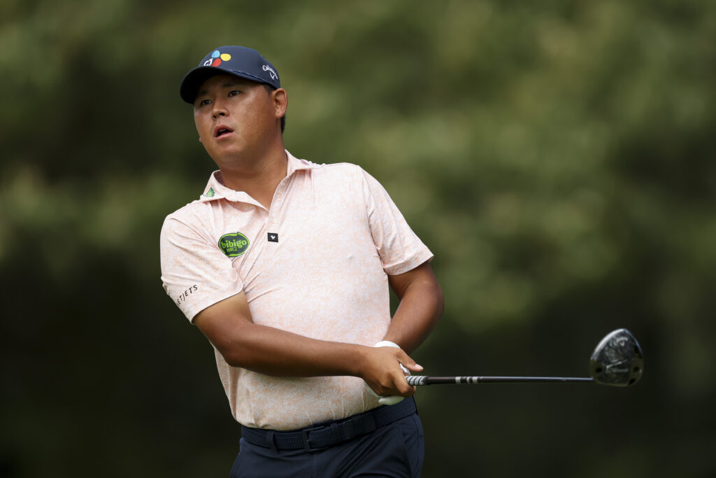 Si Woo Kim of South Korea watches a tee shot on the seventh hole during the second round of the FedEx St. Jude Championship