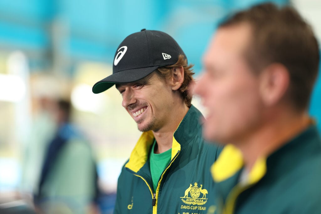 Alex de Minaur smiles during a media opportunity at Sydney Olympic Park Tennis Centre on September 10, 2025 in Sydney, Australia.