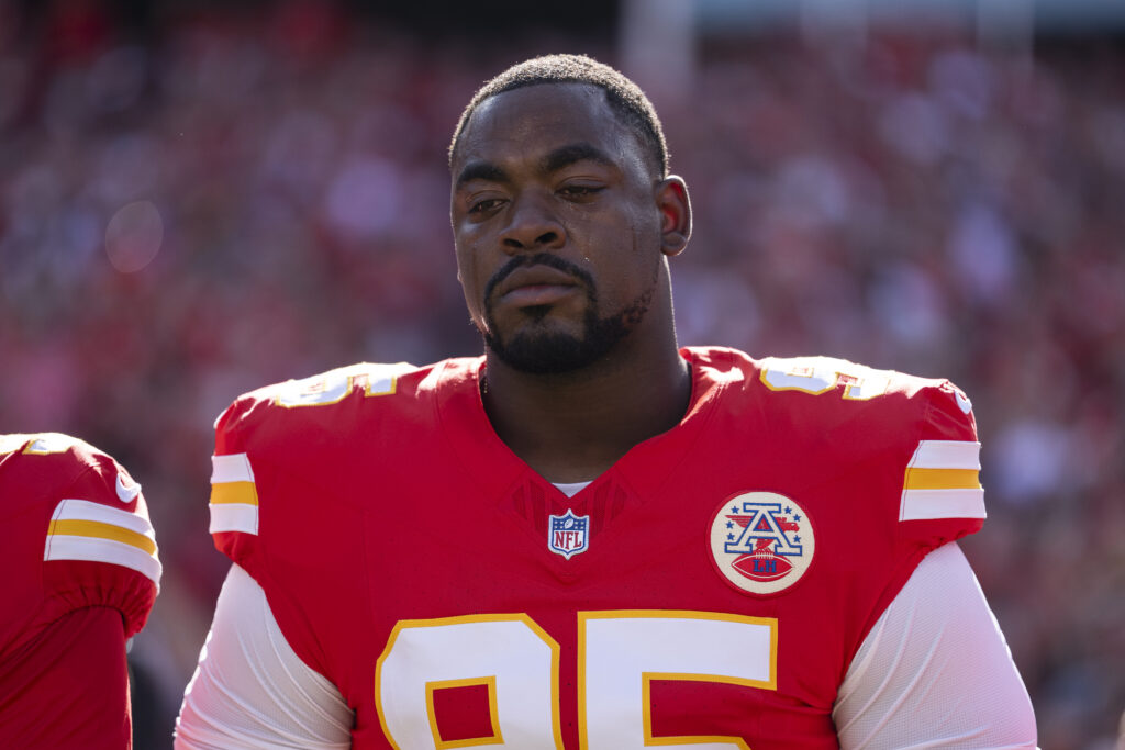 Chris Jones #95 of the Kansas City Chiefs reacts during the national anthem prior to an NFL football game against the Baltimore Ravens
