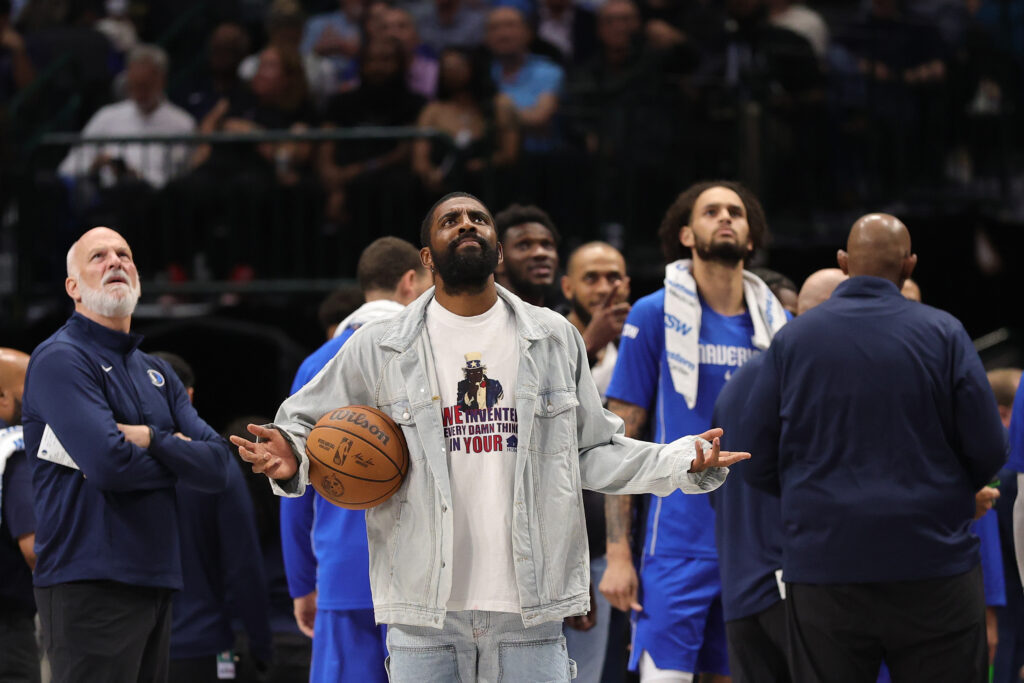 Kyrie Irving #11 of the Dallas Mavericks looks to the scoreboard during the second half against the Washington Wizards at American Airlines Center on October 24, 2025 in Dallas, Texas.