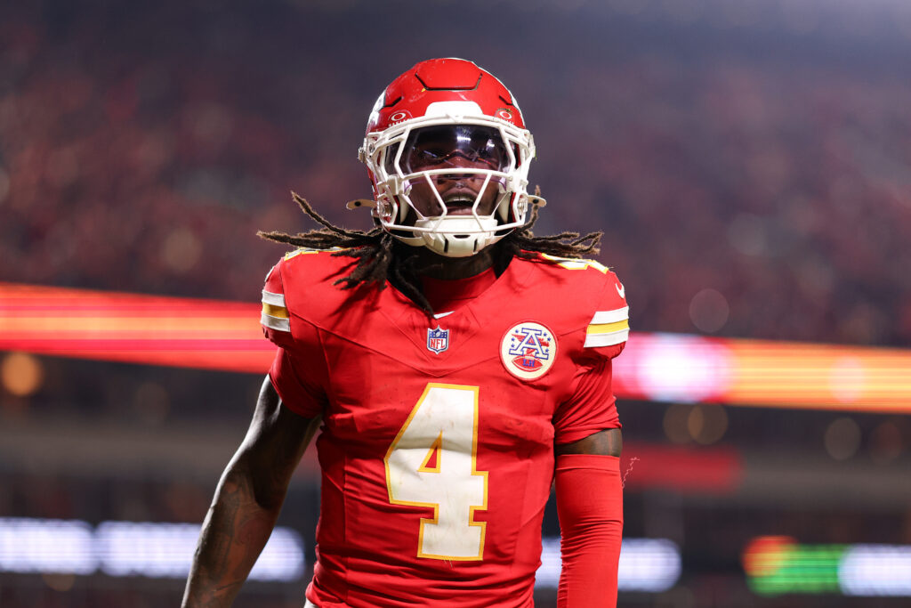 Rashee Rice #4 of the Kansas City Chiefs celebrates after scoring a touchdown during the fourth quarter against the Washington Commanders at Arrowhead Stadium.