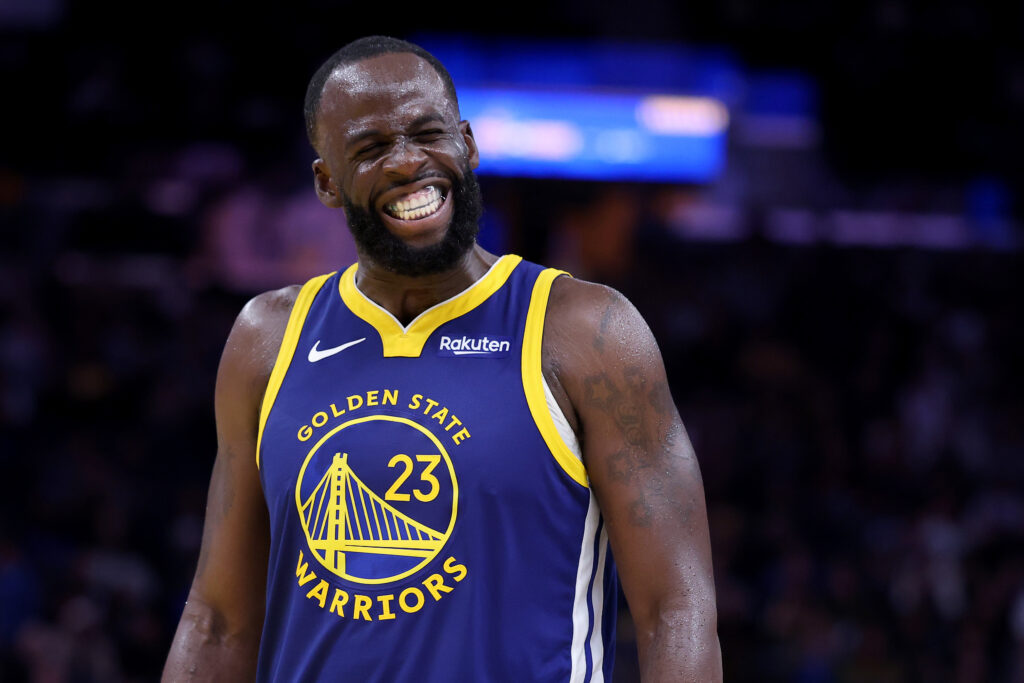 Draymond Green #23 of the Golden State Warriors reacts after the referees called a technical foul on injured Dillon Brooks #3 of the Phoenix Suns, who was sitting on the bench, during the second half at Chase Center.